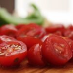 close up photography of slices of cherry tomatoes
