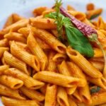 pasta with green leaf and chili pepper