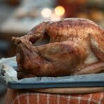 roasted chicken on blue tray